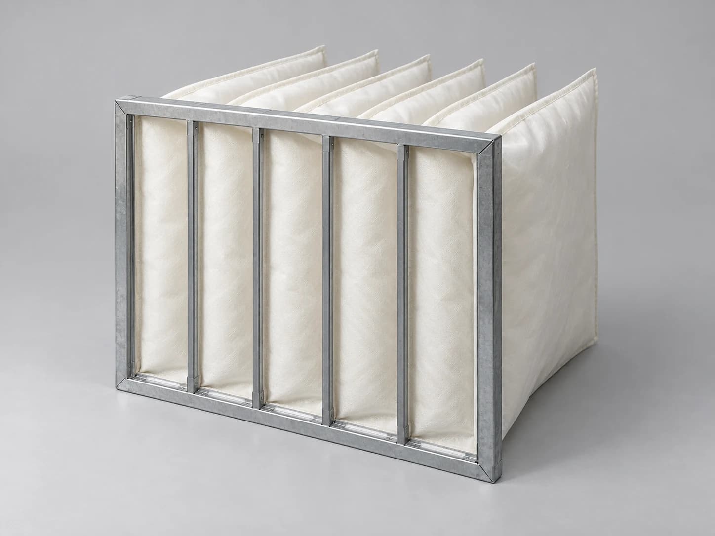 Multi-pocket air filter with a metal header frame